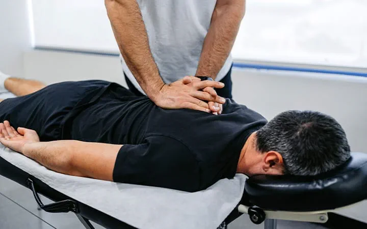 Gentle chiropractic adjustment at Ascension Health