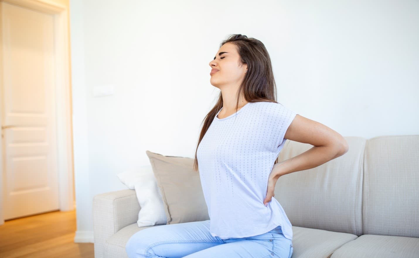 Fernley chiropractor evaluating a patient with chronic back pain